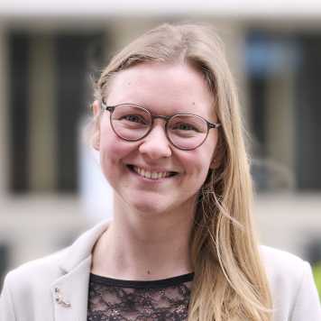 Portrait of a young female with long blond hair