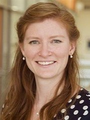 portrait of a young woman with long ginger hair