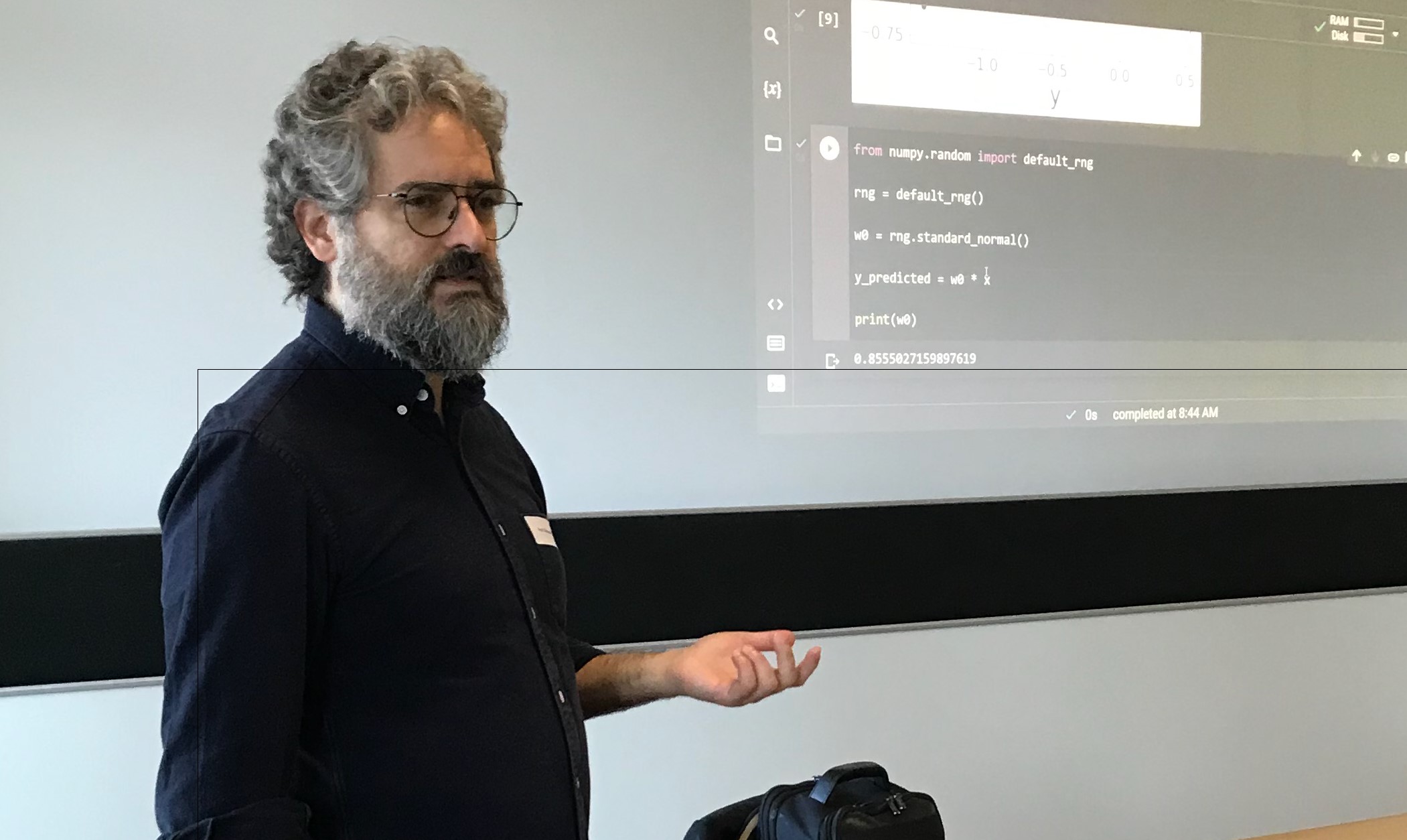 Prof. Giovanni Volpe in front of the screen