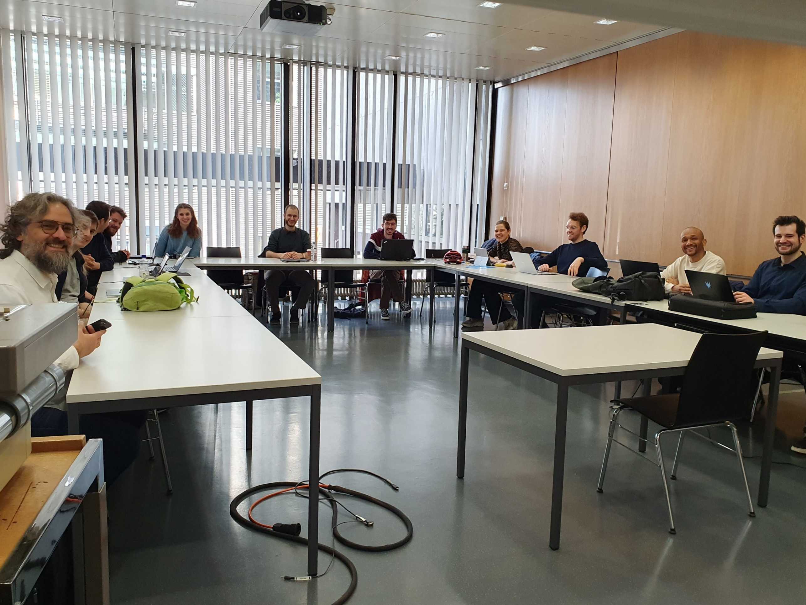 Prof. Volpe and his students during the evaluation day of the Machine Learning Course