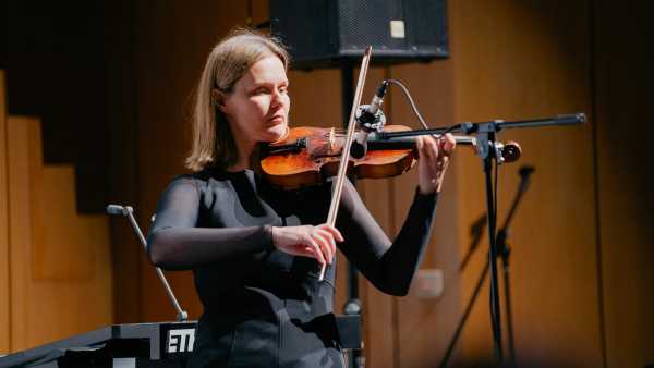 EPT Hub leader Dr. Vira Bondar playing the violin