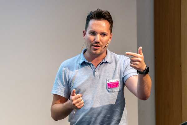 another male presenter, from chest up