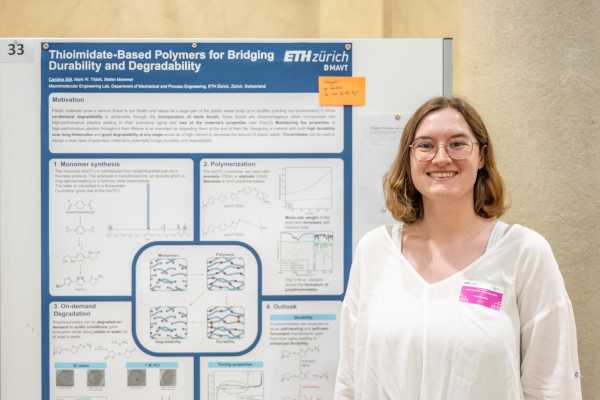 poster presenter in front of her poster