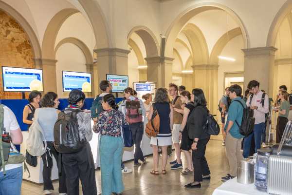 People in front of registration desk