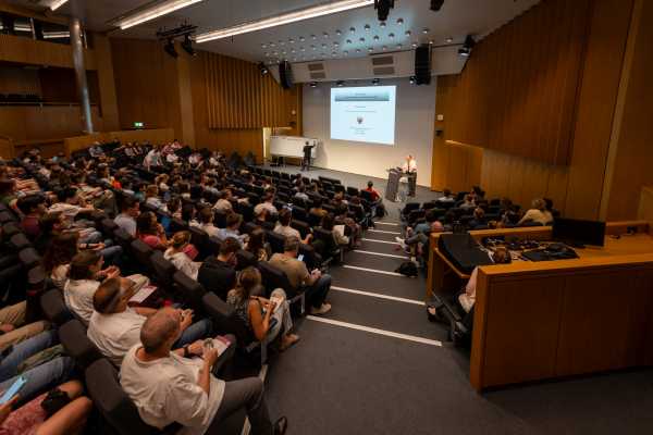 Audi Max from the back. Many people in the audience listening to the first talk